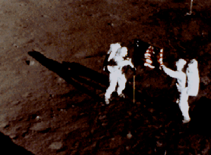Apollo 11 astronauts deploy the U.S. flag