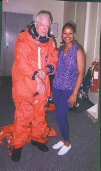 Hugh Downs suited up by McDougle in JSC Building 5 facility