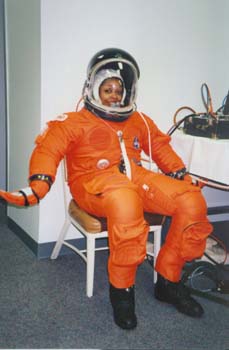 McDougle in the pressurized Advanced Crew Escape Suit (ACES).