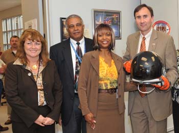 Congressman Pete Olson visits USA/FCE. Pictured l to r: Ginger Barnes (USA CEO), Willard Jones (FCE/EVA APM), McDougle, and Pete Olson.