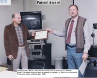 David Pippen, presenting an award to Dr. Bill Smith 