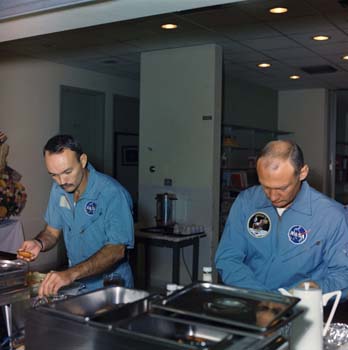 Apollo 11 Astronauts Mike Collins and Buzz Aldrin in the Lunar Receiving Lab Crew Reception Area.