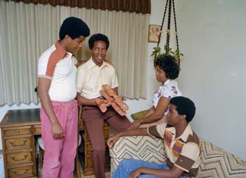 Guion S. Bluford, wife Linda Bluford, and two sons at home.  The photo was taken by Terry Slezak for a magazine article.
