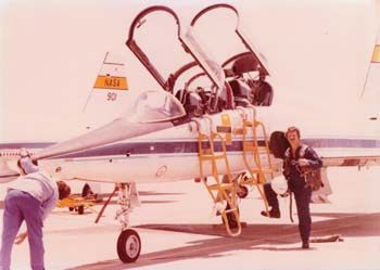 Terry Slezak in front of a T-38 Talon training aircraft.