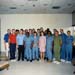 Apollo 11 crew and support personnel in group shot at the end of the quarantine period in the Lunar Receiving Lab.