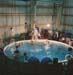 Training suited subject in Water Immersion Facility (WIF), Building 260.