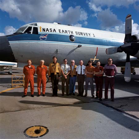 Will Fenner, Paul Nering, Larry Gaventa, unknown, John Collins, unknown, unknown, Herman Williams, Bob Gray pictured in front of the NASA C-130 Earth Resources Aircraft 
