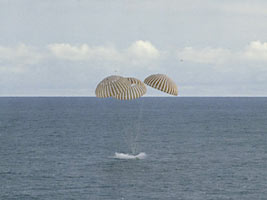 A perilous space flight comes to a smooth ending with the safe splashdown of the Apollo 13 Command Module in the South Pacific Ocean.