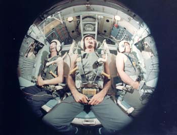 S67-24077.jpg - (L-R) Jerry Kingsmill, Mike Fox, Bob Thomas taken with fish-eye camera in the Centrifuge (1967) 