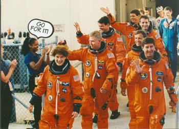 McDougle cheering on the STS-78 crew as they board the astro van and head to the pad.