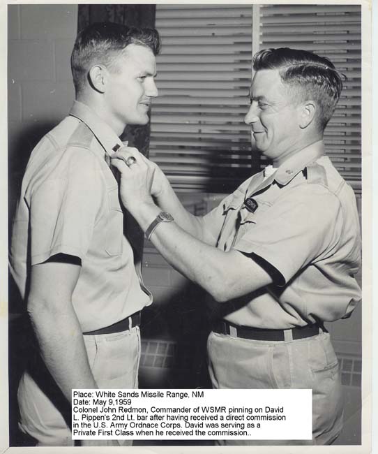 Colonel John Redmon pinning on my 2nd Lieutenant bars