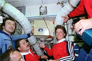 Dunbar places STS-71 patch in Mir baseblock