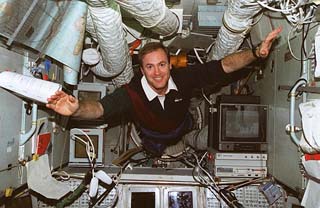 Jim Halsell flies through the Mir space station Base Block