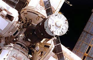 Soyuz spacecraft docking to the Mir space station central node