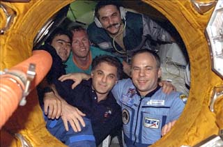 Mir 24 and STS-89 crewmembers appear in the Mir Space Station Docking Module