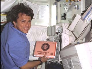 Chang-Diaz works with the Alpha Magnetic Spectrometer computers