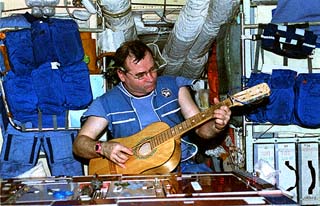 Strekalov playing guitar in baseblock